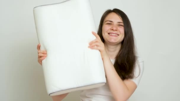 Happy Brunette Woman Dancing Her Favorite Orthopedic Pillow White Background — Vídeos de Stock