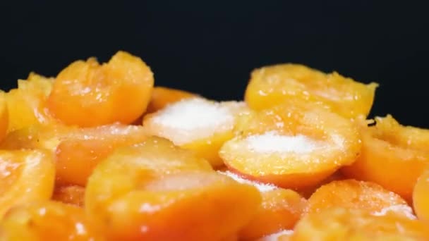 Apricots Peeled Seedless Sprinkled Sugar Swirling Black Background — ストック動画