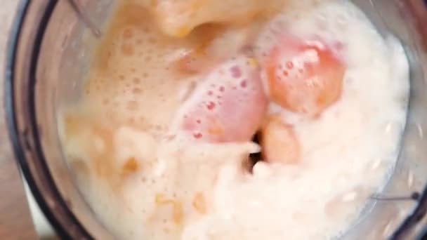 Process Preparing Milkshake Apricots Top View Fruits Blender — Vídeo de Stock