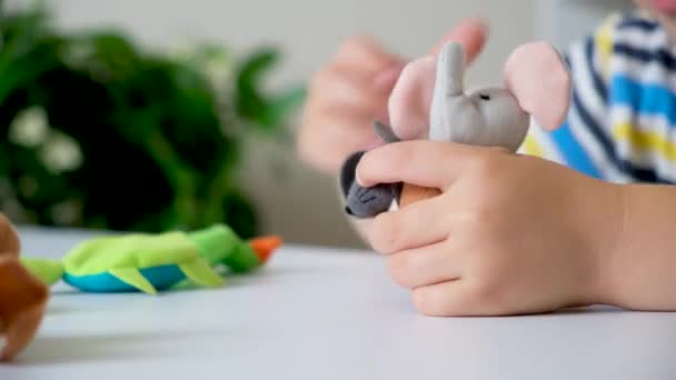 Preschool Child Plays Finger Theater Puts Toys His Fingers — Αρχείο Βίντεο