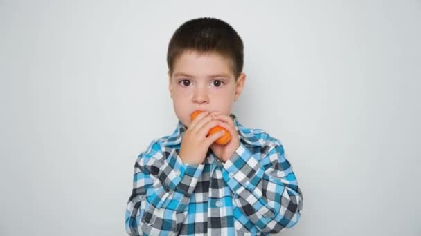 Year Old Boy Eats Carrots Leaves Vegetables Children — Stockvideo