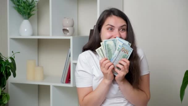 Funny Woman Keeps Lot Money Looks Smile Anticipating Purchases — Vídeo de Stock
