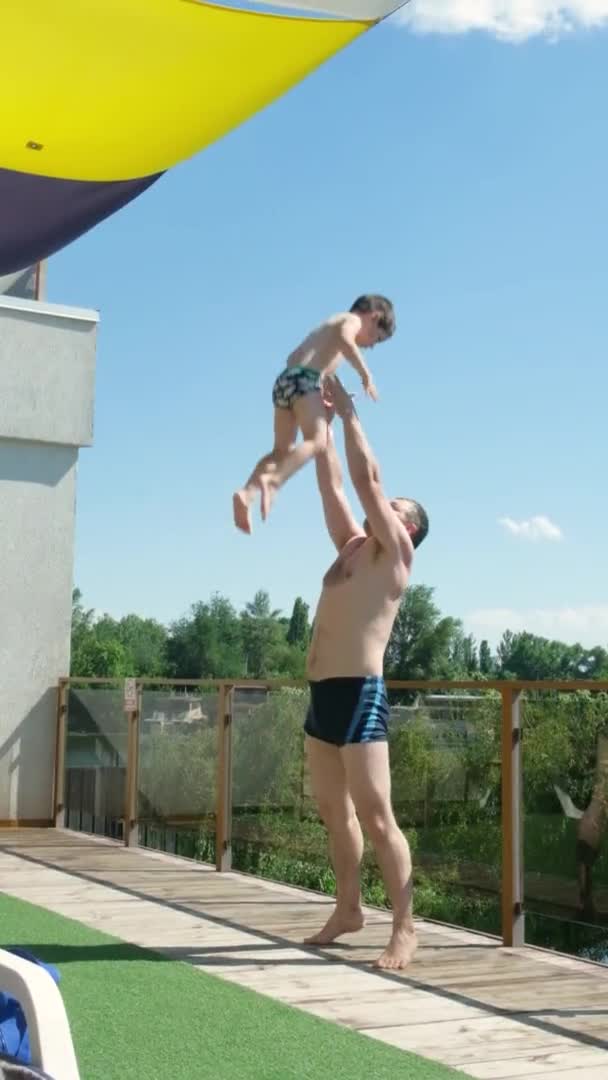 Strong Father Tosses His Son High Air Catches Nature Summer — Stockvideo