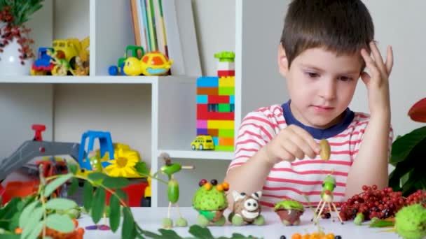 Preschool Boy Plays Animal Figurines Made Acorns Chestnuts Cones — Vídeos de Stock