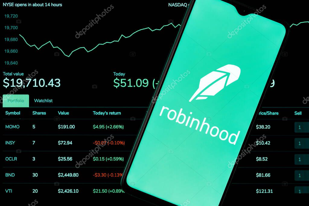 Kazan, Russia - Oct 19, 2021: Robinhood Markets is an American broker-dealer company. A smartphone with the Robinhood logo on the background of the live trading webpage. Robinhood dashboard.