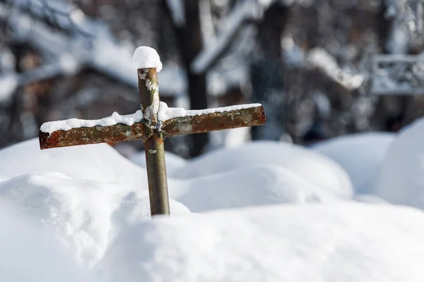 Dilapidated Homemade Metal Crucifix Snowdrift Cemetery Stock Photo