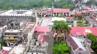 Lateral drone video starting from center of Xilitla to see a panoramic view, Mexico