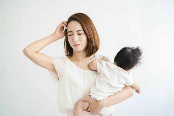 Asian Mother Holding Baby Looking Tired — Stock Photo, Image