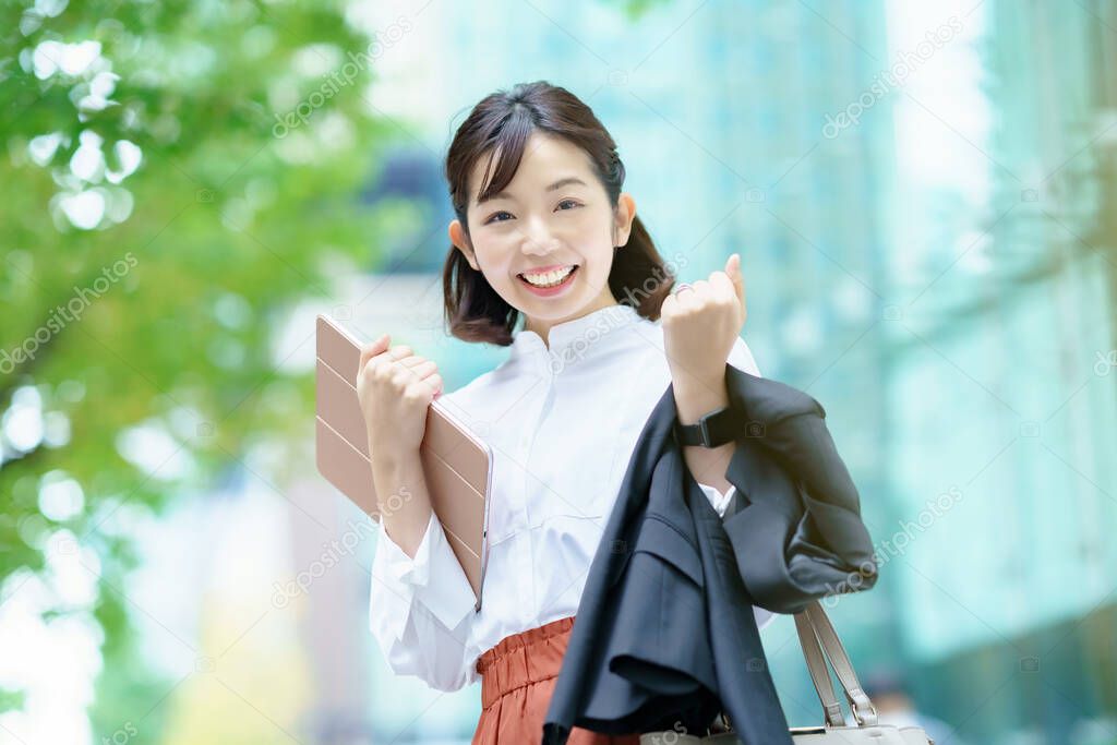business woman in a cheering pose