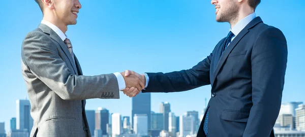 Two Businessmen Shaking Hands Blue Sky — Stock Photo, Image