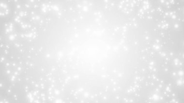 Parlayan beyaz parçacıkların patlayıcı bir şekilde yayıldığı bir alan. 