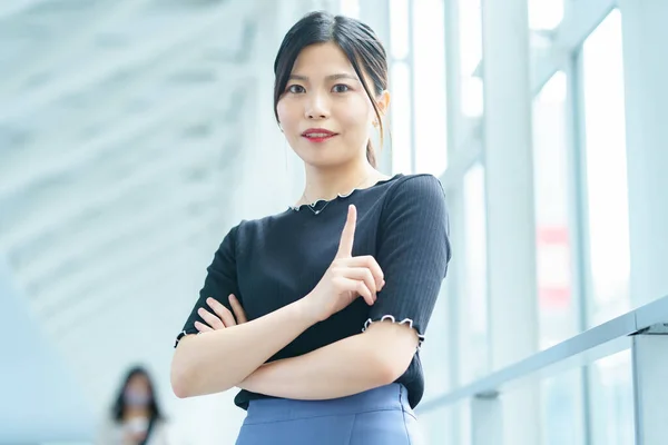 Young Business Woman Pointing Her Index Finge — Stockfoto
