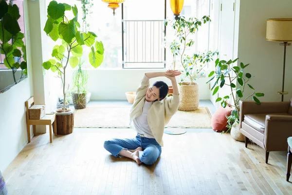 Asian Woman Stretching Room —  Fotos de Stock