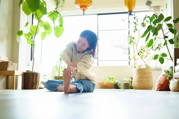 Asian Woman Stretching Room —  Fotos de Stock