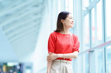 A woman commuting to work in the office district