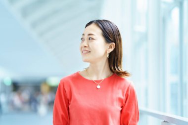 A woman commuting to work in the office district