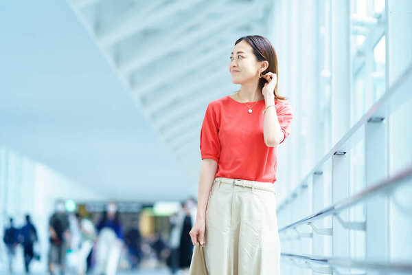 A woman commuting to work in the office district