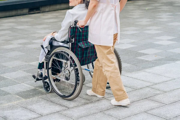 Woman Wheelchair Woman Apron Care Outdoors — Stock Photo, Image