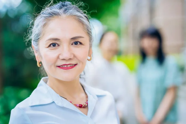 Asian Gray Haired Woman Portrait Outdoors — Stockfoto