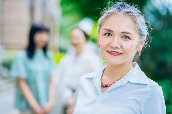 Asian Gray Haired Woman Portrait Outdoors — Stockfoto