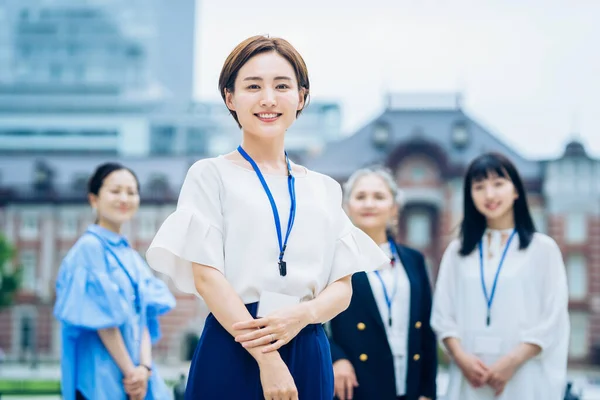 Asian Business Women Lined Outdoors — Stok fotoğraf