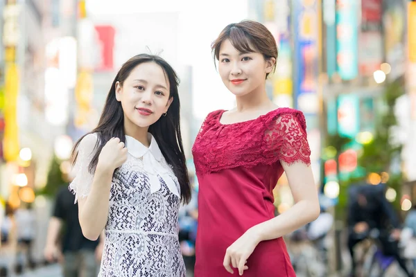 Two Young Women Posing Downtown — Stok fotoğraf