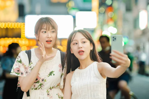 Young Women Taking Selfies Downtown — Stok fotoğraf