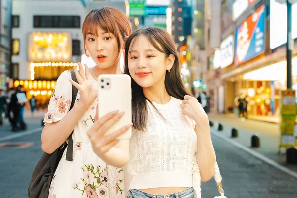 Young Women Taking Selfies Downtown — Stok fotoğraf