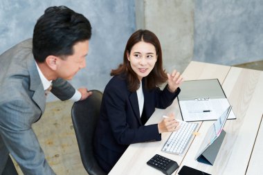 Business people who do desk work at office