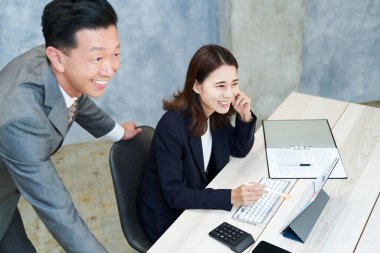 Business people who do desk work at office