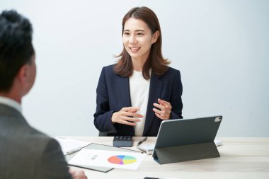 business woman giving a presentation in the office
