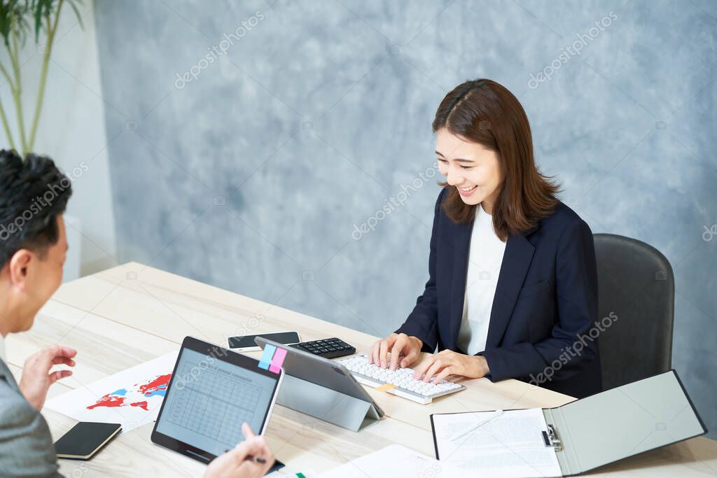 Business people who do desk work at office