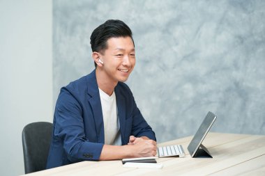 Businessman in office casual clothes at office