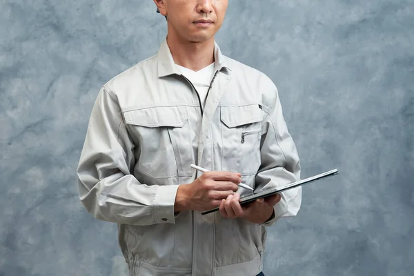 Middle Man Work Clothes Gray Wall — Stok fotoğraf