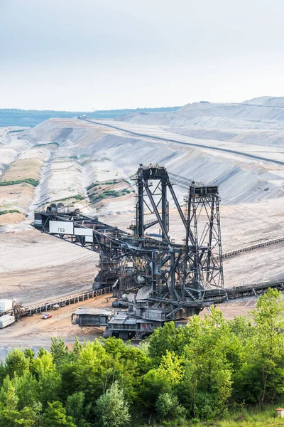 Huge excavator in the lignite opencast mine Garzweiler in the Rhine area in Germany, vertical