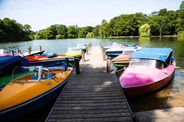 stock image colorful pedal boats for hire in the English Garden in Munich, tourism