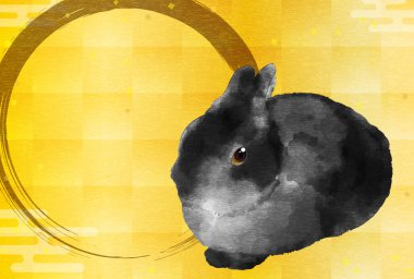 Tavşan 2023 yılı için Japon Yeni Yıl kartı, siyah tavşan ve altın folyo arka plan.