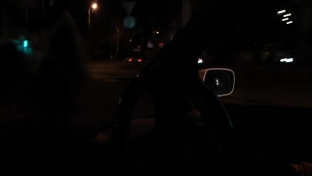 Mans hands on the steering wheel. Night driving — Wideo stockowe