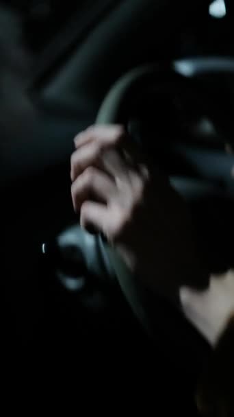Mans hands on the steering wheel. Night driving — Wideo stockowe
