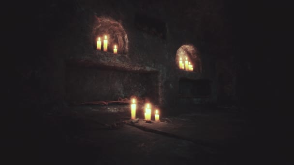 Old dark catacombs with candles — Stock Video