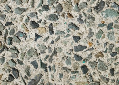 Beton zeminde küçük çakıl taşları. Yukarıdan ateş edildi.