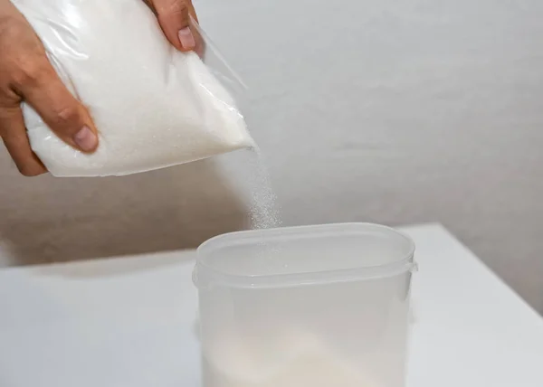 Storing Sugar Home Arranging Place Kitchen Pouring Sugar Bag Plastic 图库照片