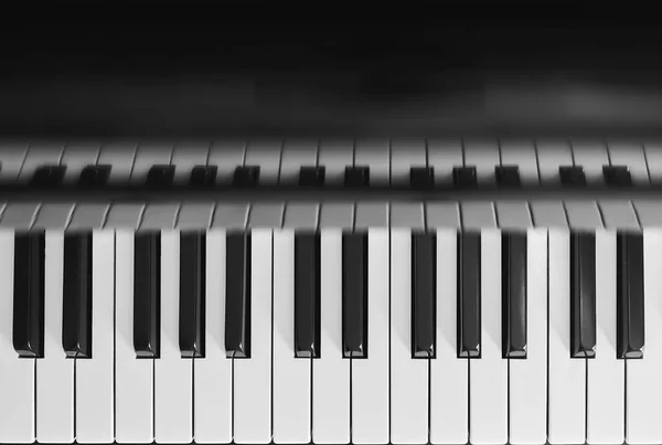 detail of a top view of a piano keyboard