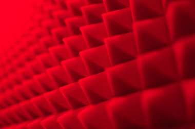 detail of the sound insulator in the shape of pyramids or triangles in a music studio