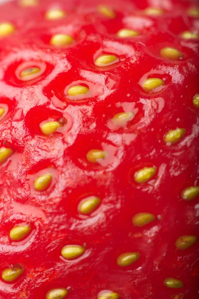Macro photo of strawberry texture, Close up of a strawberry fruit as background