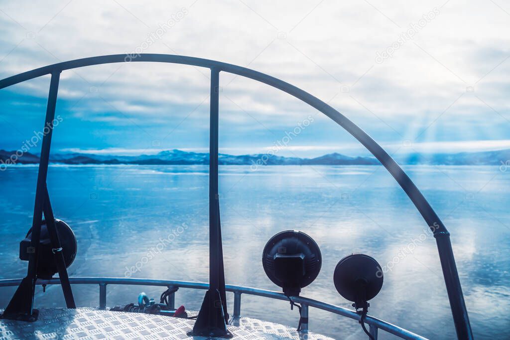 View from a hovercraft that moves on the frozen lake Baikal, travel lifestyle concept