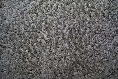 Gray texture of a lush carpet