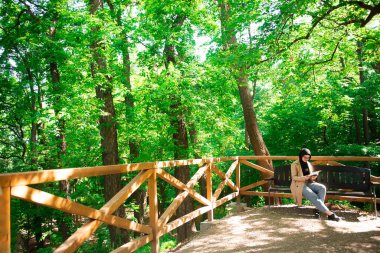 Muslim reader enjoying her day in the park