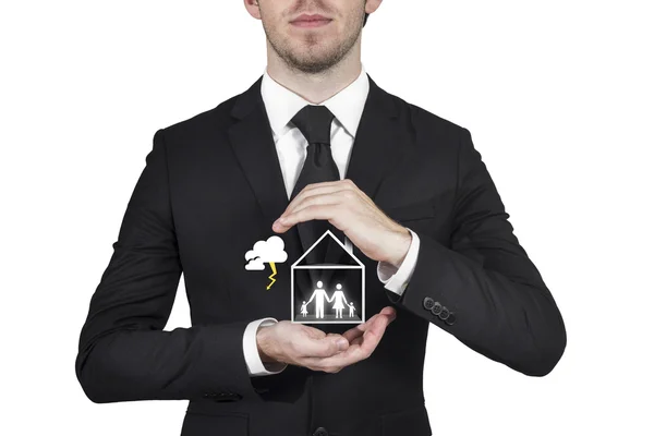 Businessman protecting family house — Stock Photo, Image