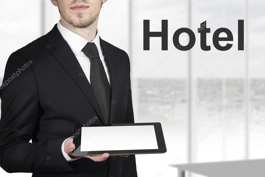 Businessman tablet hotel